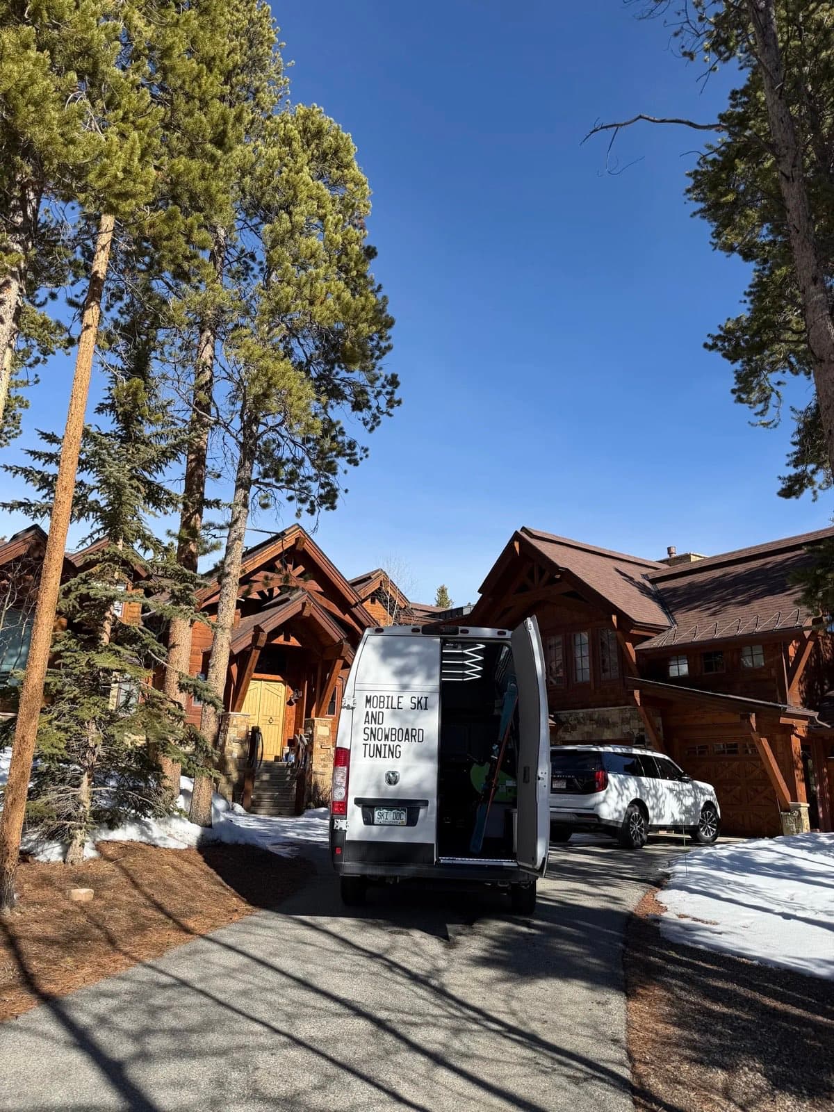 Slope Ready tuning van parked at a Colorado mountain lodge for a group program